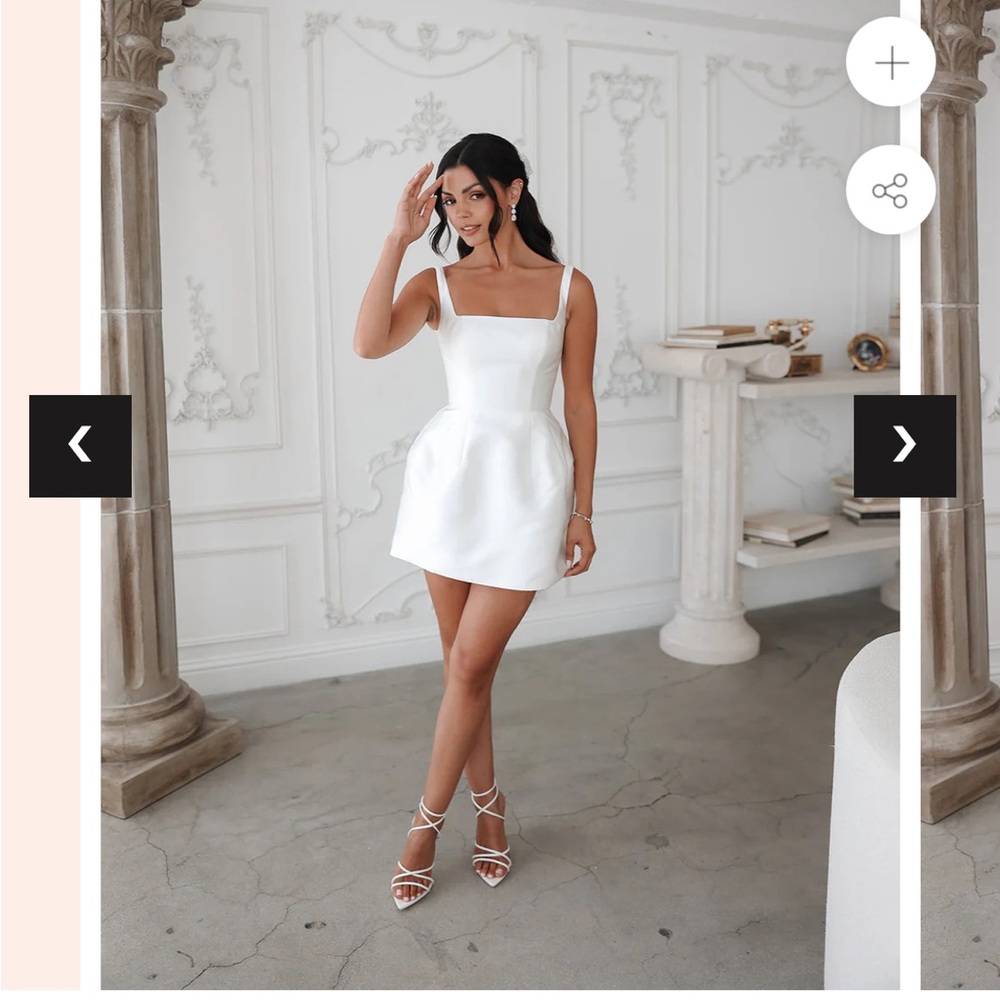 UNTAMED PETALS BY AMANDA JUDGE Elegant White Mini Dress
